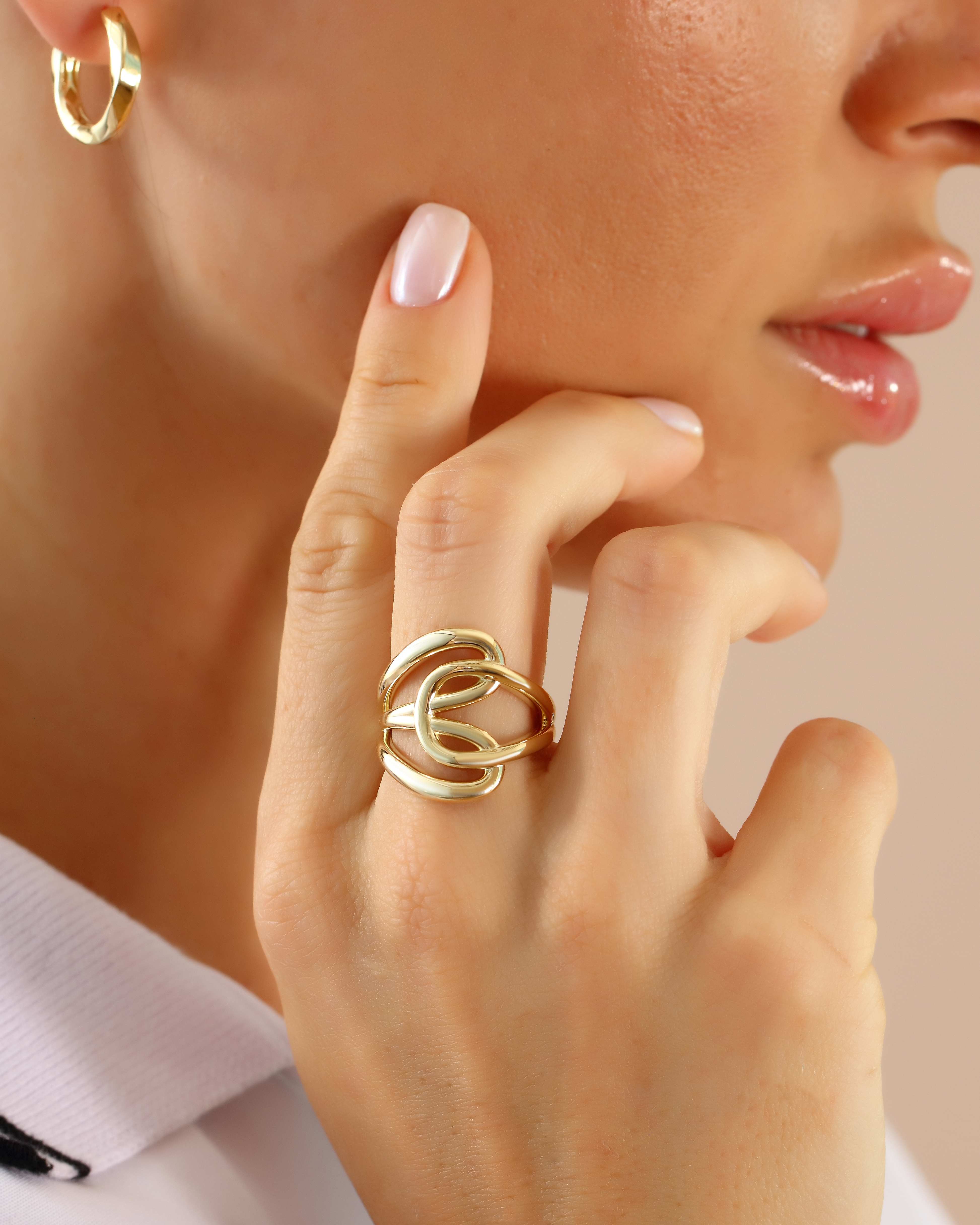 VIECLAT Solid Yellow Gold Interlocking Knot Ring Worn Closeup