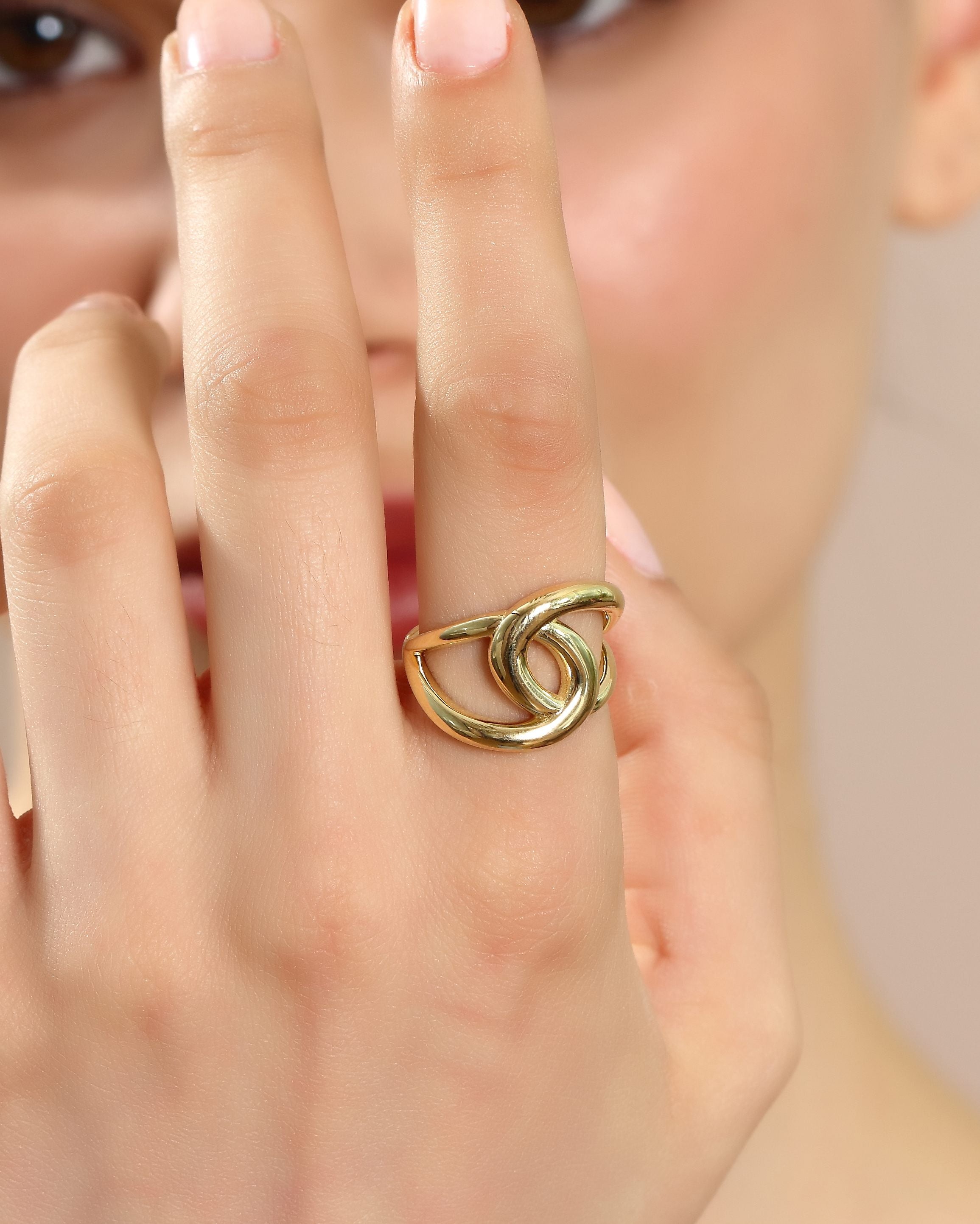 VIECLAT Solid Yellow Gold Interlocking Swirl Ring On Hand