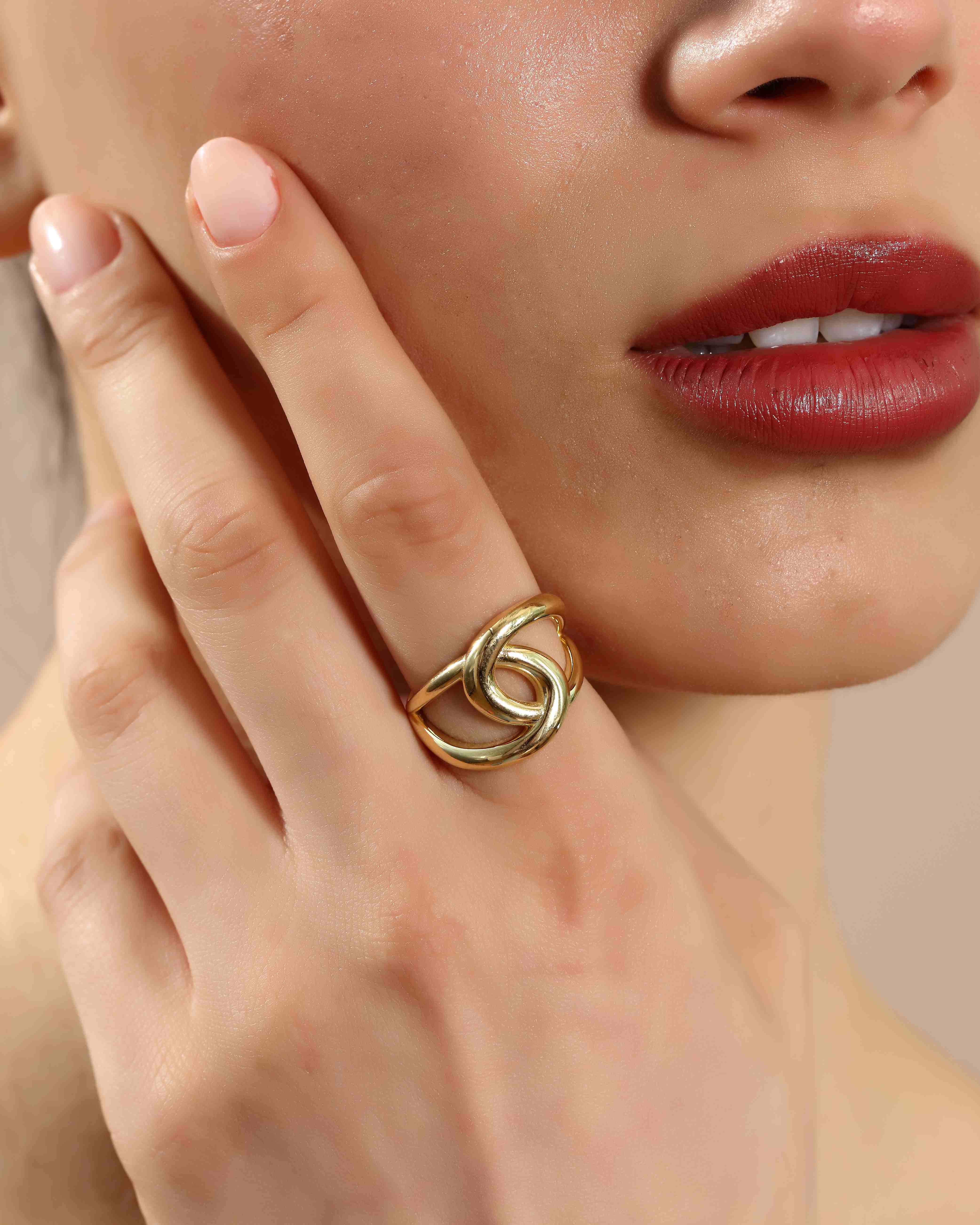 VIECLAT Solid Yellow Gold Interlocking Swirl Ring On Hand