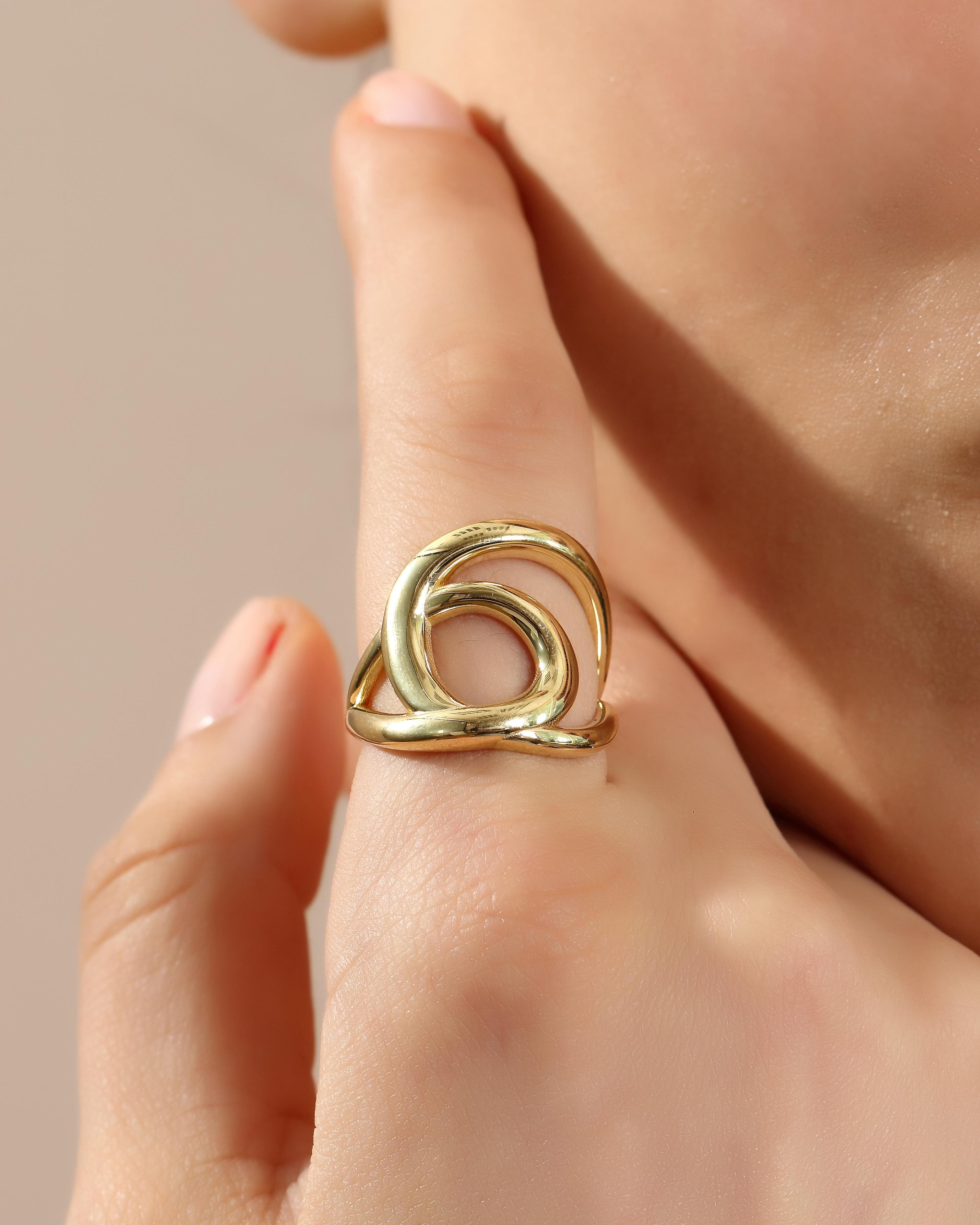VIECLAT Solid Yellow Gold Interlocking Swirl Ring On Hand