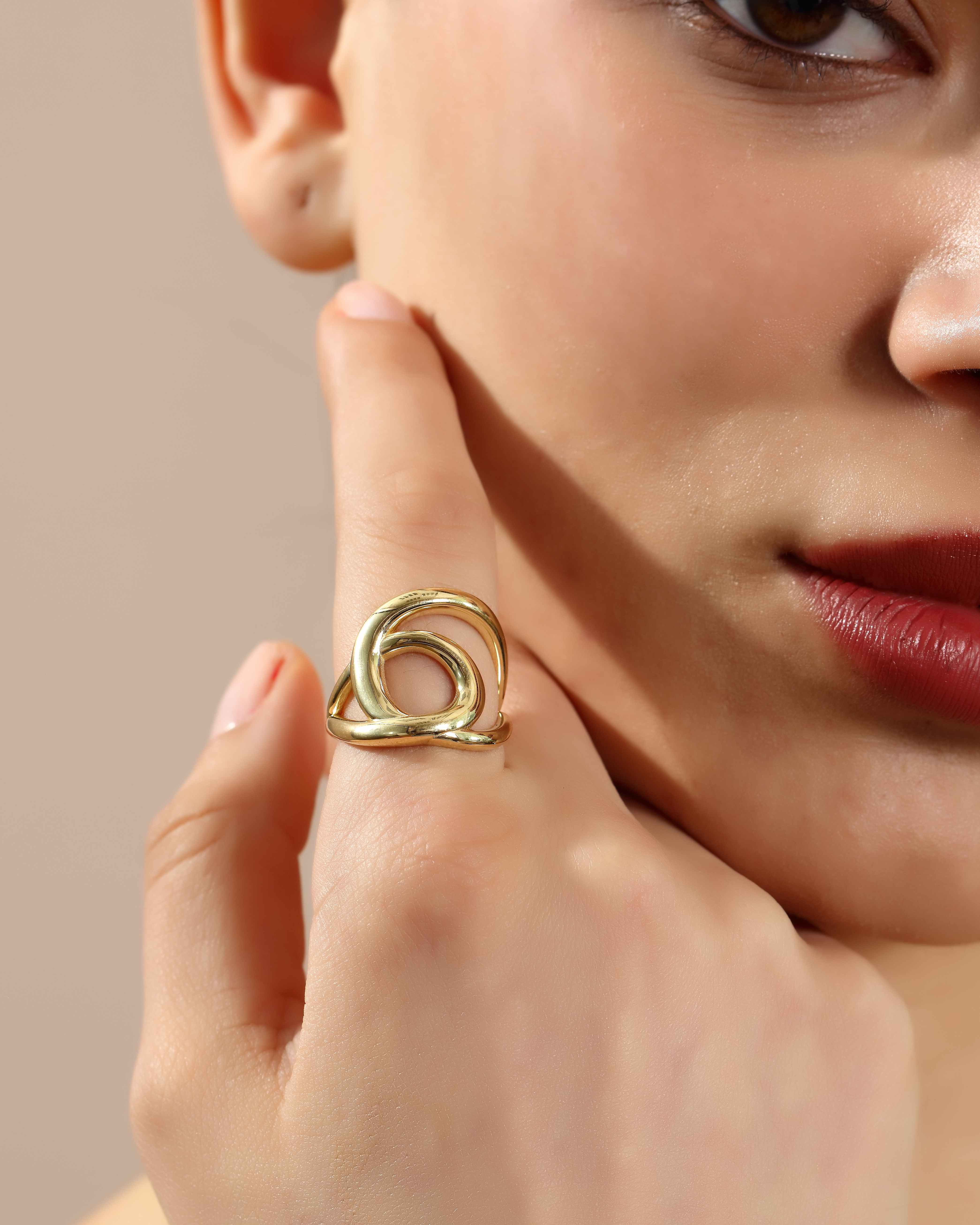 VIECLAT Solid Yellow Gold Interlocking Swirl Ring On Hand