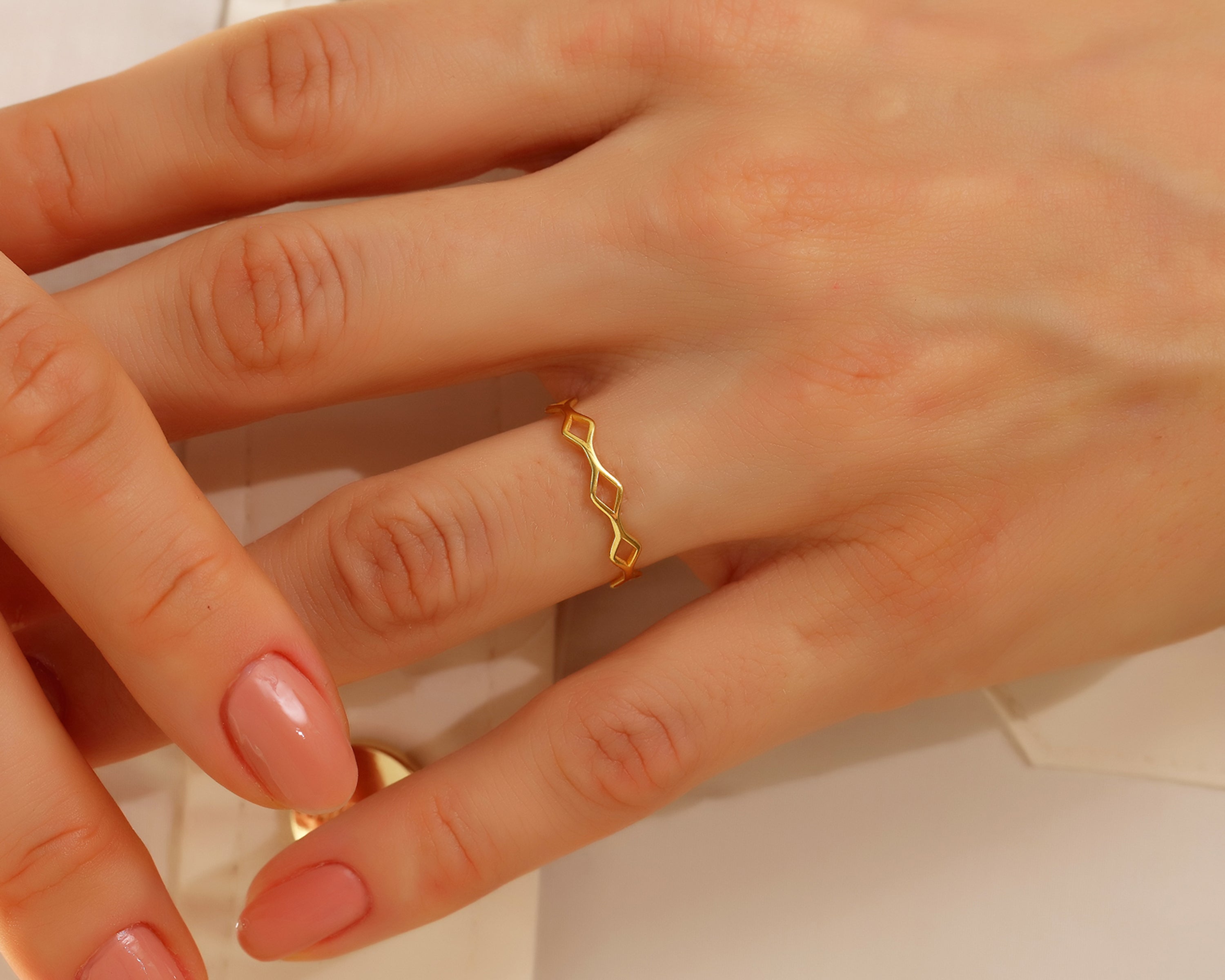 Open Rhombus Link Ring